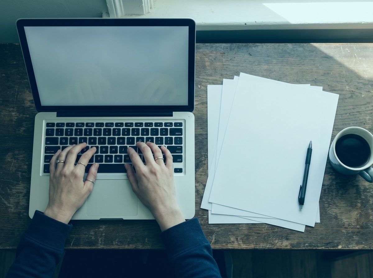 Preparing a master's application and statement of purpose on a laptop